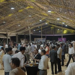 Guests networking in an open-plan event space