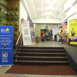 Stage setup for corporate presentation and keynote speech managed by Kriti Events