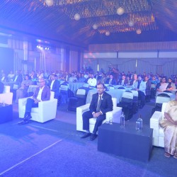 Guests engaged in conversation during event break