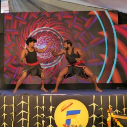 Detail shot of event branding on stage screen