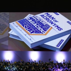 Professional panel discussion stage and audio-visual setup for corporate conference"
